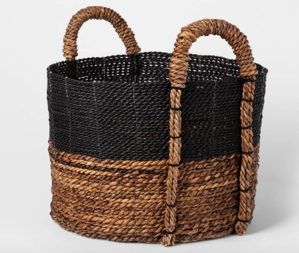 Black and woven circular basket. 