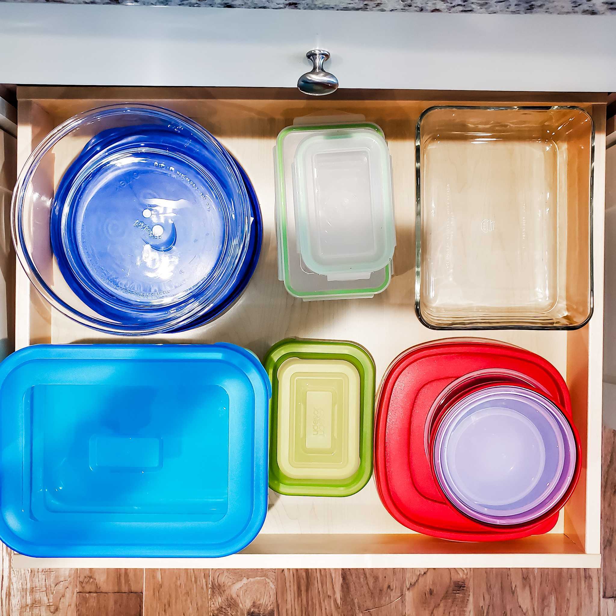 Tupperware organized in kitchen drawer. 