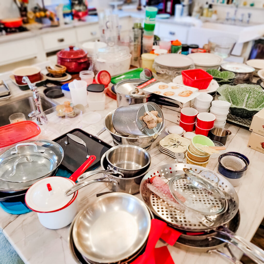 kitchen counter with many gadgets and dishes, declutter